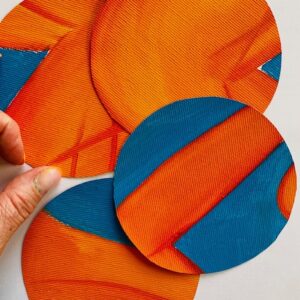 Four coasters in oil